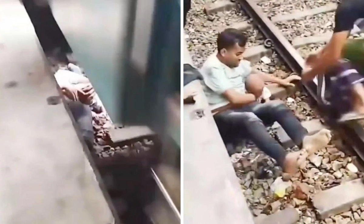 El abrazo que los salvó padre protege a su hijo del tren